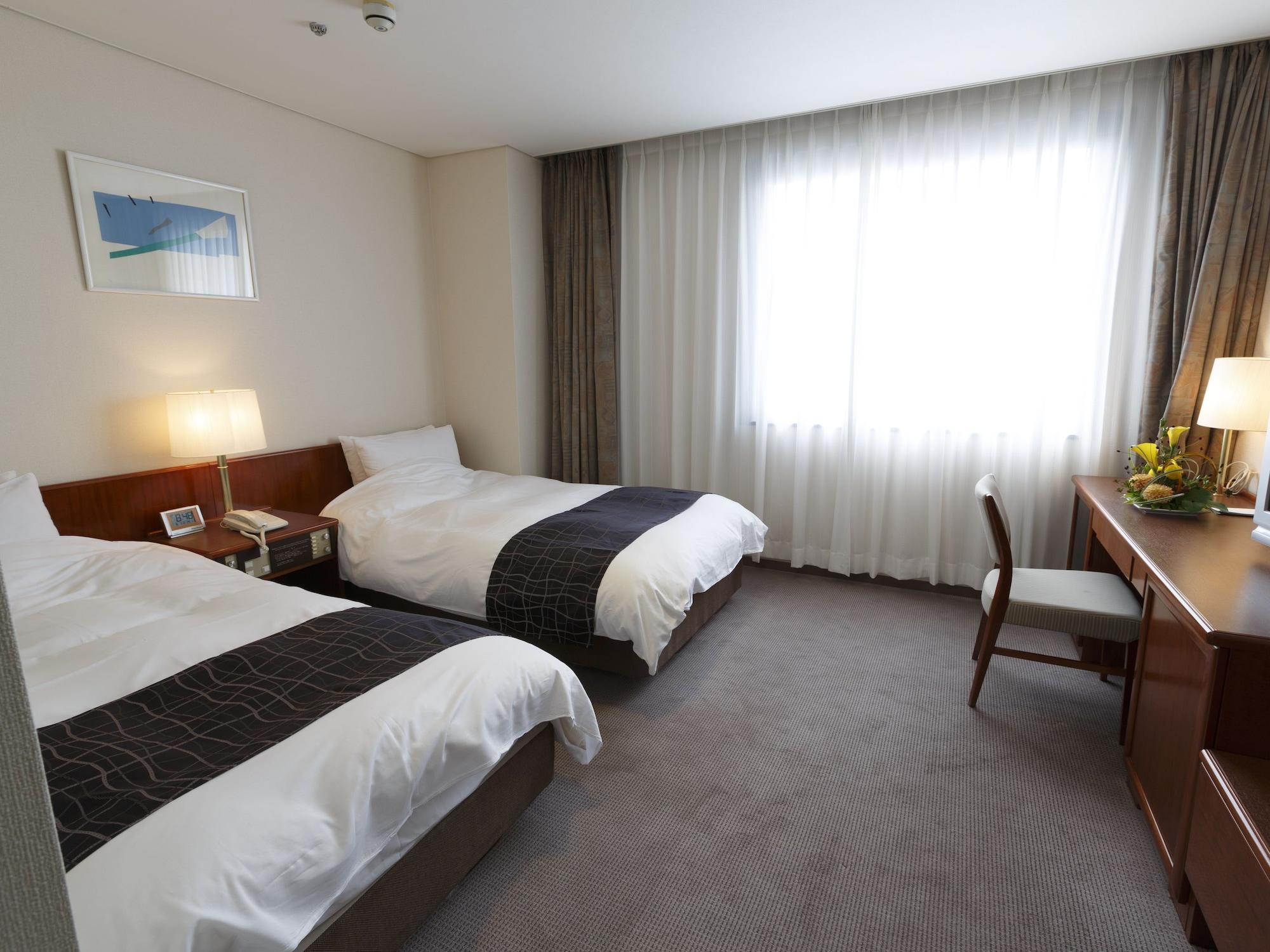 Hotel Pearl Garden Takamatsu Bagian luar foto